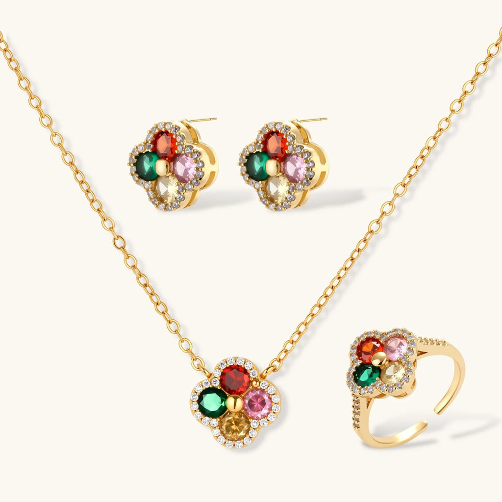 Gold-plated clover jewelry set with red, pink, green and champagne CZ stones surrounded by crystal borders