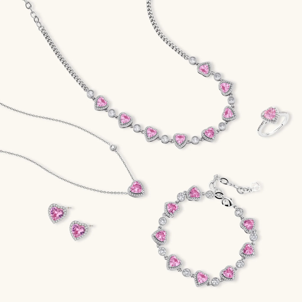 Pink heart-shaped cubic zirconia jewelry set with white gold plating featuring necklace, earrings, bracelet and ring